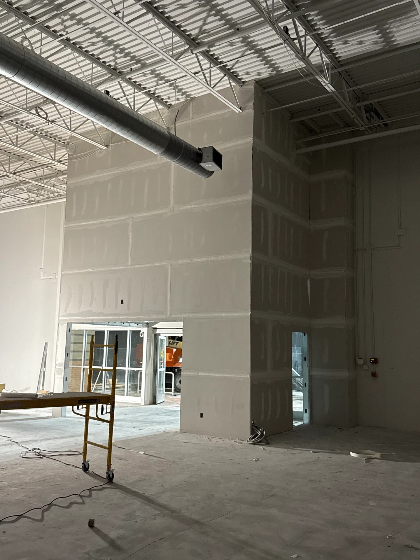 Drywall finish on a commercial interior buildout